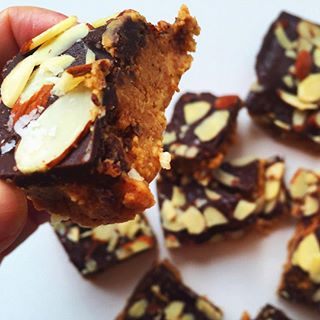 What a Reese's peanut butter cup wants to be when it grows up. (Check out "Chocolate Covered Almond Butter Bars" on kickanddinner.com) #almondbutter #sortahealthy #almondbutteraddict #almondbutterobsessed #nobakerecipe